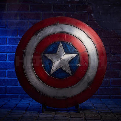 1:1 Captain America shield replica displayed upright on a stand against a blue-lit wall